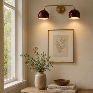 burgundy wall sconce
double wall sconce
brass vanity light
modern wall fixture
dual arm wall light
bathroom wall light
mid century light
burgundy sconce
vanity light brass
minimalist light
wall light fixture
home decor light
luxury wall light
burgundy wall sconce, double wall light, brass wall sconce, vanity wall light, modern wall lamp, bathroom lighting, dome shade light, 2 light sconce, minimal wall light, bedside wall lamp, contemporary light, wall sconce brass, vanity light fixture
