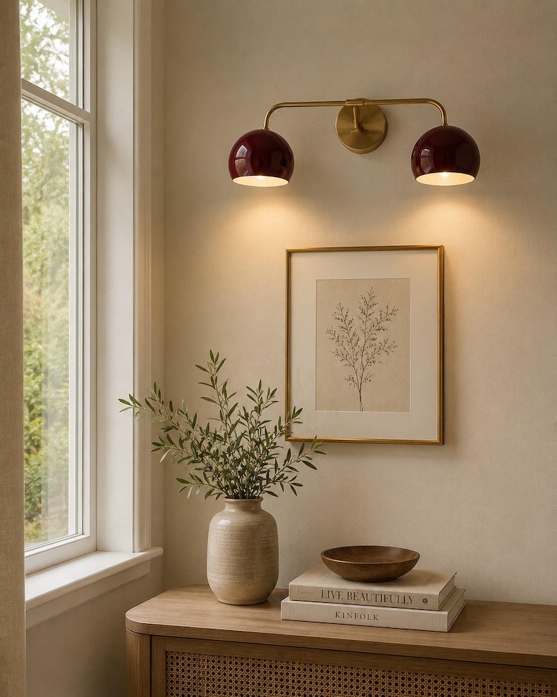 burgundy wall sconce
double wall sconce
brass vanity light
modern wall fixture
dual arm wall light
bathroom wall light
mid century light
burgundy sconce
vanity light brass
minimalist light
wall light fixture
home decor light
luxury wall light
burgundy wall sconce, double wall light, brass wall sconce, vanity wall light, modern wall lamp, bathroom lighting, dome shade light, 2 light sconce, minimal wall light, bedside wall lamp, contemporary light, wall sconce brass, vanity light fixture
