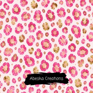 May include: A repeating pattern featuring pink and gold leopard print spots on a light pink background. The design includes various sizes of circular and irregular shapes with pink outlines and gold centres. The text Abeska Creations is visible.