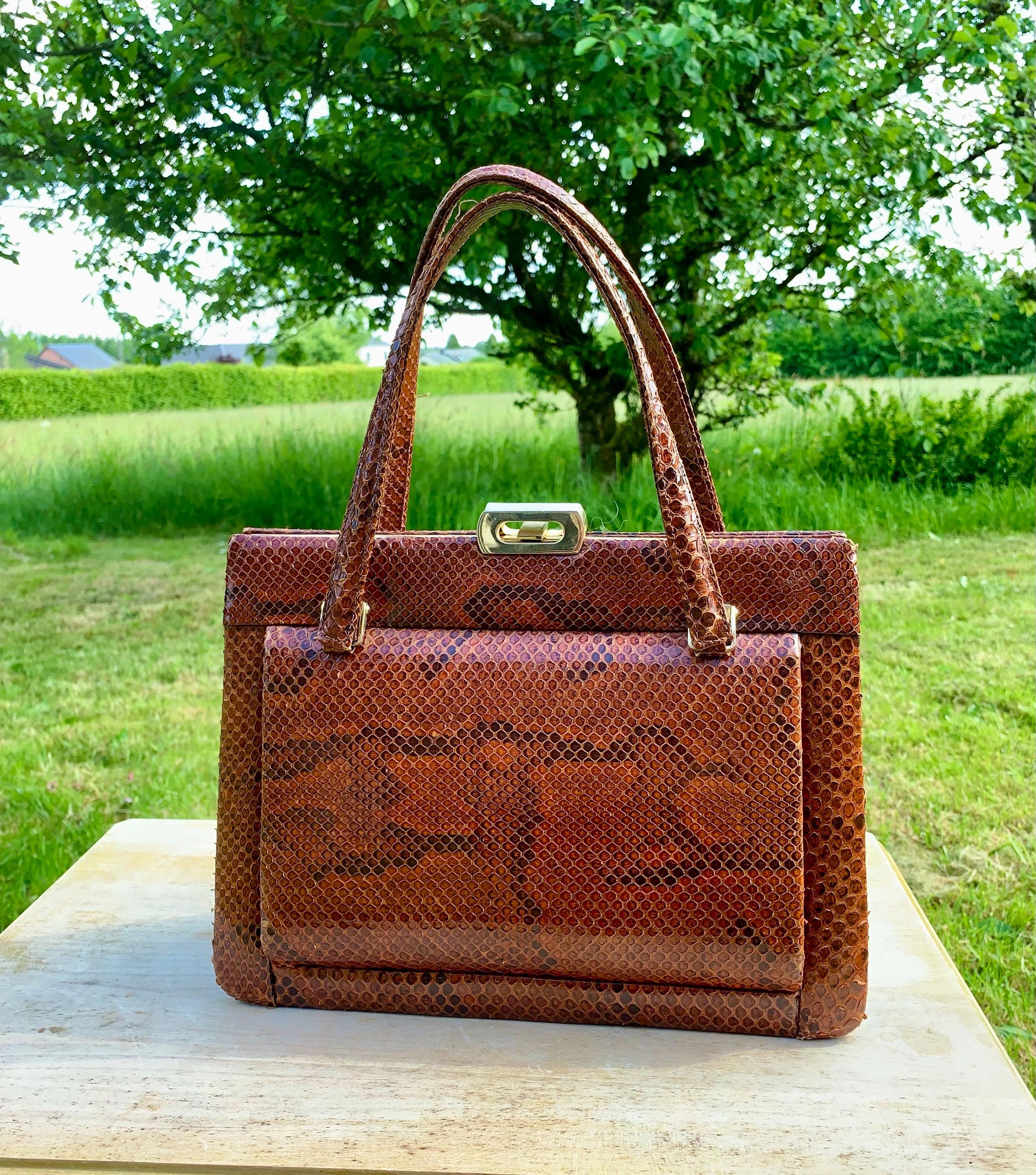 Borsa a mano in pelle di pitone con cornice del 1970 borsa a