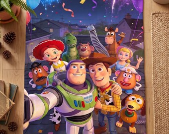 May include: A rectangular throw blanket featuring a colourful graphic print of the Toy Story character ensemble including Buzz Lightyear, Woody, Jessie, Rex, and Mr. Potato Head against a night sky background with fireworks and confetti.