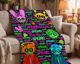 May include: A black fleece throw blanket featuring a vibrant, repeating pattern of cartoon characters and the word SPRUNKI in bright neon colours. The design includes pink, yellow, green, orange, and blue characters with dripping effects.