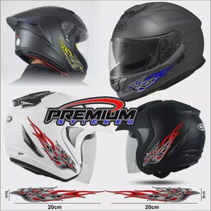 May include: A set of flame-patterned adhesive decals for motorcycle helmets, featuring red, blue, and yellow colour options. The decals measure 20 cm in length and 5 cm in height, as indicated by the visible measurement markings on the product display.