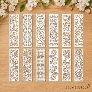 May include: Twelve rectangular white stencils featuring various intricate laser-cut patterns, including floral, geometric, and scrollwork designs, arranged in two rows. The word JEVINCO is printed in the bottom right corner of the image.