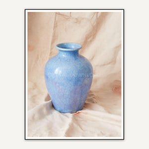 Cracked blue ceramic vase study
