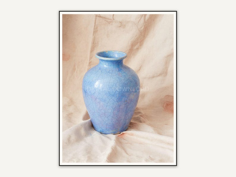 Cracked blue ceramic vase study