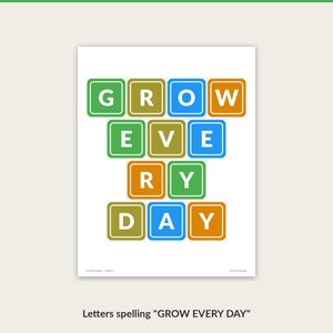 Cut-out letters spelling GROW EVERY DAY