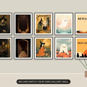 Ten Halloween prints from the bundle framed together as a gallery wall above a console table