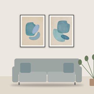 patina blue abstracts printable art framed above a sofa in a styled living room