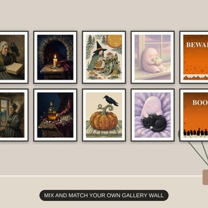 Ten Halloween prints from the bundle framed together as a gallery wall above a console table