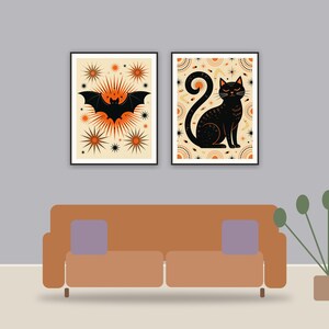 halloween decor printable art framed above a sofa in a styled living room