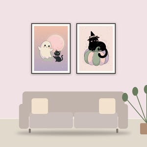 pastel halloween decor printable art framed above a sofa in a styled living room