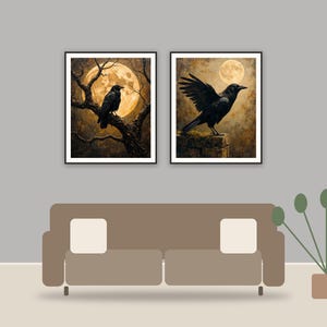 Antique Raven Portraits printable art framed above a sofa in a styled living room