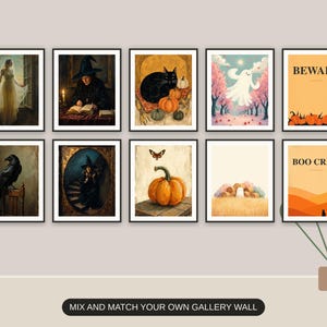 Ten Halloween prints from the bundle framed together as a gallery wall above a console table