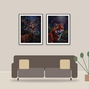 vintage animal portraits printable art framed above a sofa in a styled living room