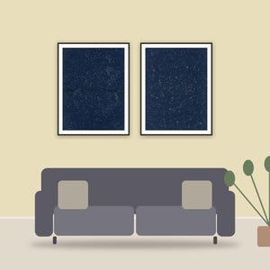celestial zodiac art printable art framed above a sofa in a styled living room