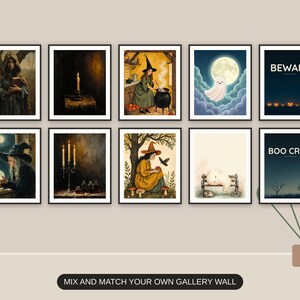 Ten Halloween prints from the bundle framed together as a gallery wall above a console table