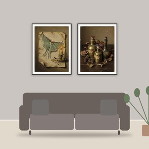 vintage halloween printable art framed above a sofa in a styled living room