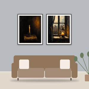 Moody Candle Studies printable art framed above a sofa in a styled living room