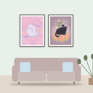 creepy cute halloween prints printable art framed above a sofa in a styled living room