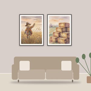 whimsical autumn farm art printable art framed above a sofa in a styled living room