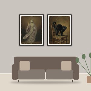 halloween gallery wall printable art framed above a sofa in a styled living room