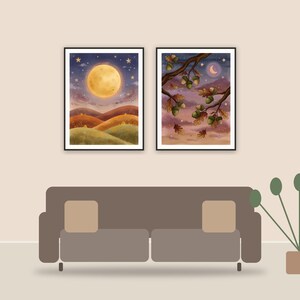 harvest moon celestial art printable art framed above a sofa in a styled living room