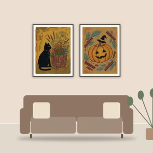 halloween kitchen prints printable art framed above a sofa in a styled living room