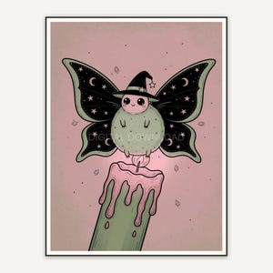 Moth with witch hat wings on candle