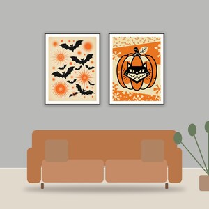 halloween decor printable art framed above a sofa in a styled living room