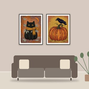 halloween decor and spooky season wall art printable art framed above a sofa in a styled living room