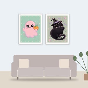 creepy cute wall art printable art framed above a sofa in a styled living room