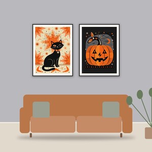 halloween decor printable art framed above a sofa in a styled living room