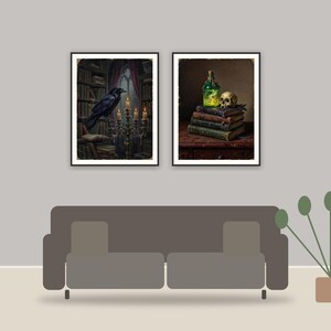 dark academia print printable art framed above a sofa in a styled living room