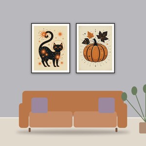halloween decor and spooky season wall art printable art framed above a sofa in a styled living room