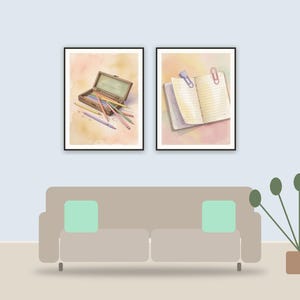 vintage school supply illustrations printable art framed above a sofa in a styled living room