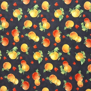May include: A fabric pattern with a repeating design of pumpkins and red leaves on a dark background. The pumpkins are in shades of yellow, orange, and red, with green leaves. The theme is autumn or fall.