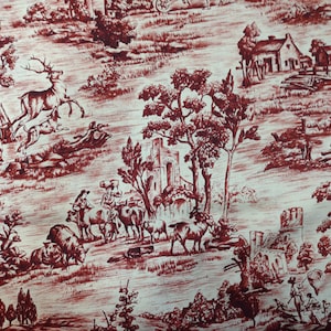 Può includere: Un tessuto toile rosso e bianco con un motivo ripetuto di una scena di campagna. Il motivo comprende alberi, case, animali e persone.