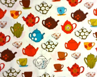 May include: A repeating pattern featuring teapots and teacups in a variety of colours, such as red, green, brown, and blue, set against a white backdrop. The teapots display diverse designs, including floral and polka dot patterns, with varied teacup styles.