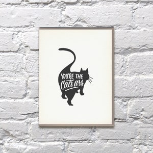 Vous êtes la carte de presse à lettres du Chat’s Ass