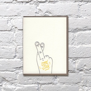 Bonne chance! Carte de presse à lettres croisées de doigts