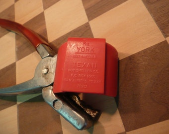YORK Nut and Lobster Claw SHELLER, The Texan Model, made in San Angelo, Tx. Manual Sheller with curved blades and plastic guard, easy to use