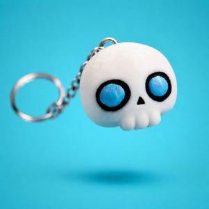 Brelok Taplings™ Skully NFC | Programowalny i wielokrotnego zapisu inteligentny tag NFC | Udostępniaj strony internetowe, linki, muzykę i media społecznościowe | Figurka kolekcjonerska