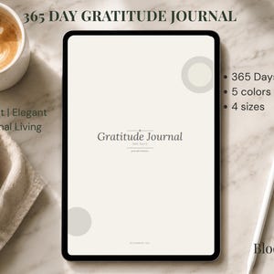 May include: A digital tablet displaying a 365 Day Gratitude Journal with a cream-colored background, dark gray text, and two light gray circles. The screen shows the title Gratitude Journal, 365 Days, and the brand name Bloomrise Design.