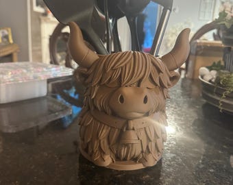 Soporte para utensilios con forma de vaca de las Tierras Altas