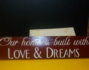 Home Decor Sign 24x6 Our Home is built with Love and Dreams