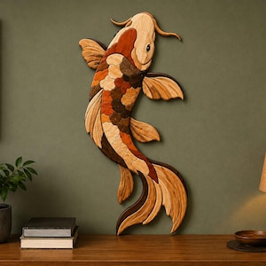 May include: A wall-mounted koi fish sculpture crafted from multiple pieces of wood in varying natural tones including light tan, deep orange, dark brown, and cream. The fish is depicted in a curved swimming motion with detailed fins and scales.