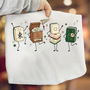 Four anthropomorphic mahjong tiles with faces and arms, one holding a "Mahjong Lover" flag.