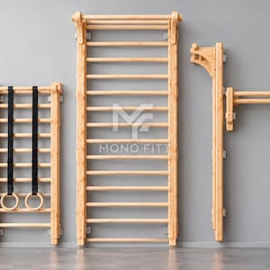 May include: A light-colored wooden wall-mounted exercise ladder system featuring a central climbing frame, a side section with black straps and wooden rings, and a separate horizontal pull-up bar attachment, with the text MONO FITT centered.