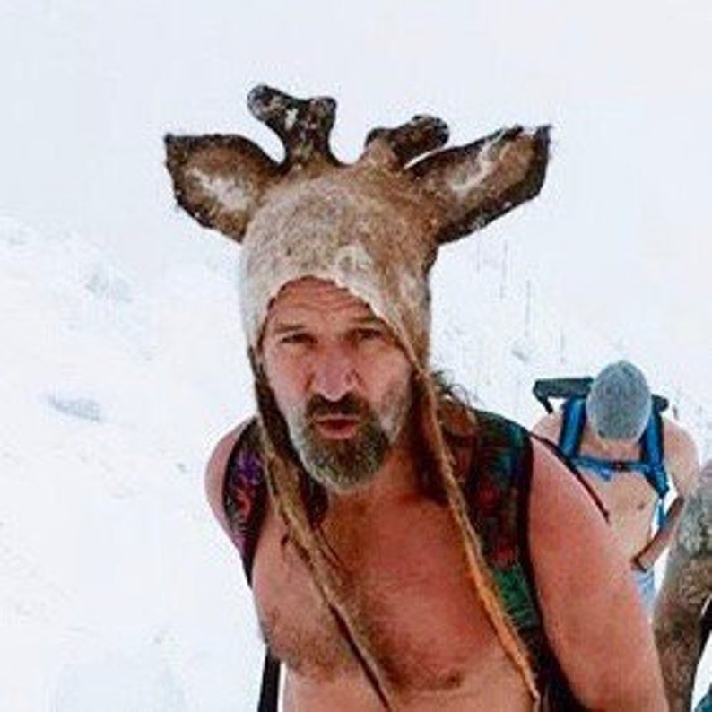 Deer antler felted hat with large ears in light and dark browns as worn by ice man Wim Hof while trekking in the snow with just shorts and sandals